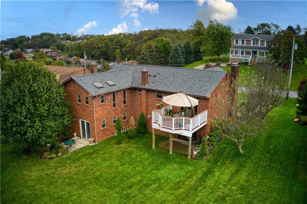 17 Parkcrest Drive Cecil, PA 15321 - Photo 25 of 25 a aerial view of a house with a yard table and chairs