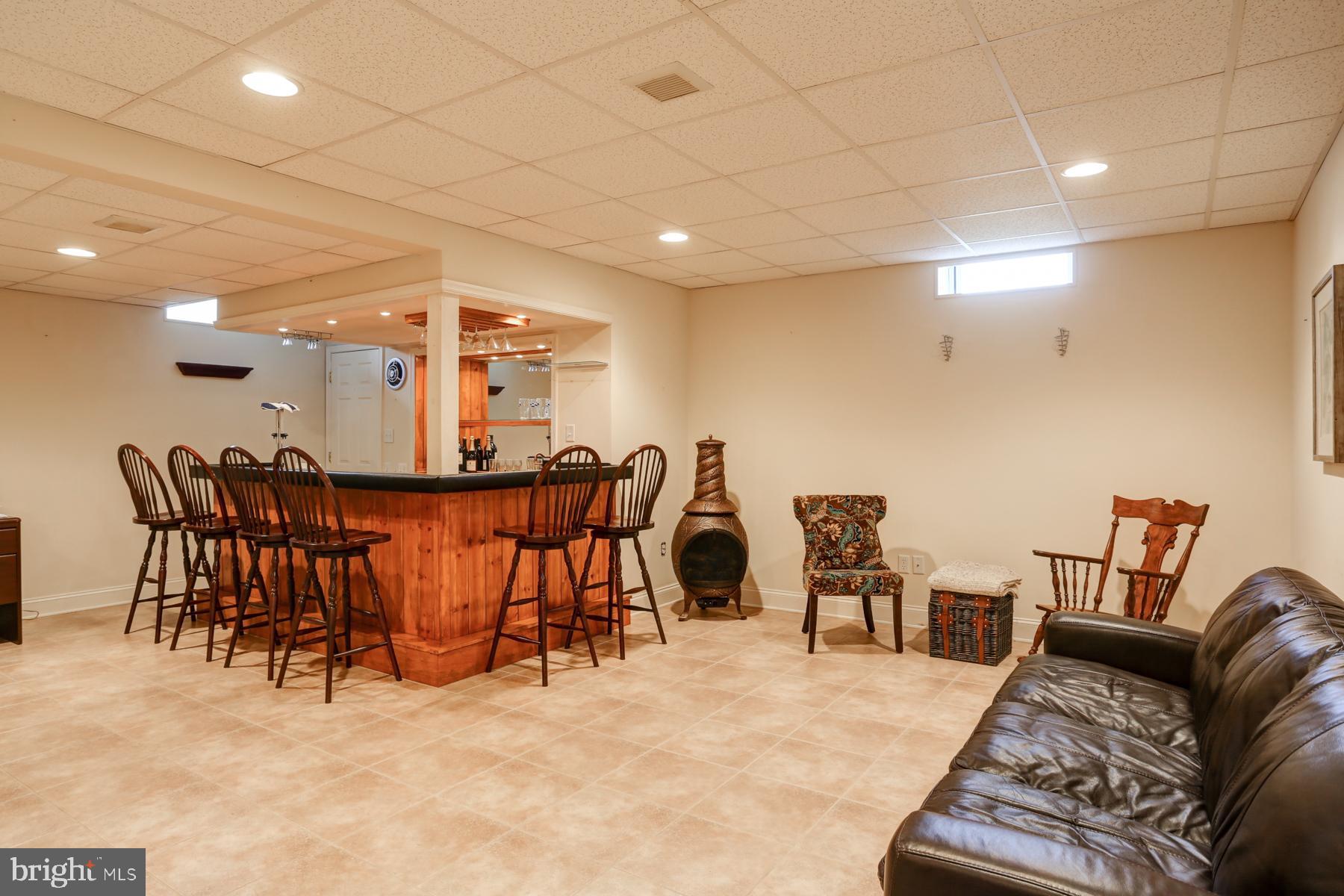 55 Carriage Road Palmyra, PA 17078 - Photo 43 of 50 Lower Level Family Room with Wet Bar