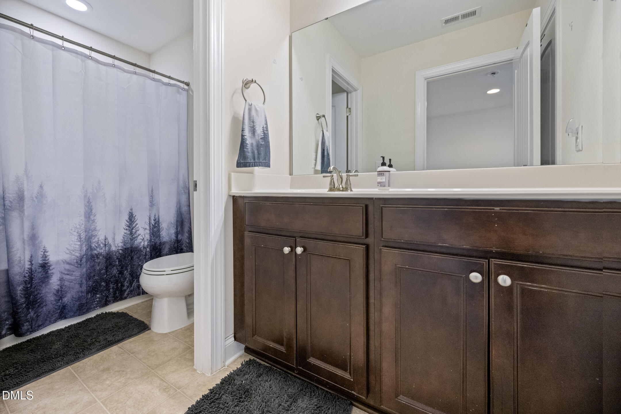 3541 Fairstone Road Wake Forest, NC 27587 - Photo 26 of 39 a bathroom with a granite countertop sink toilet and shower