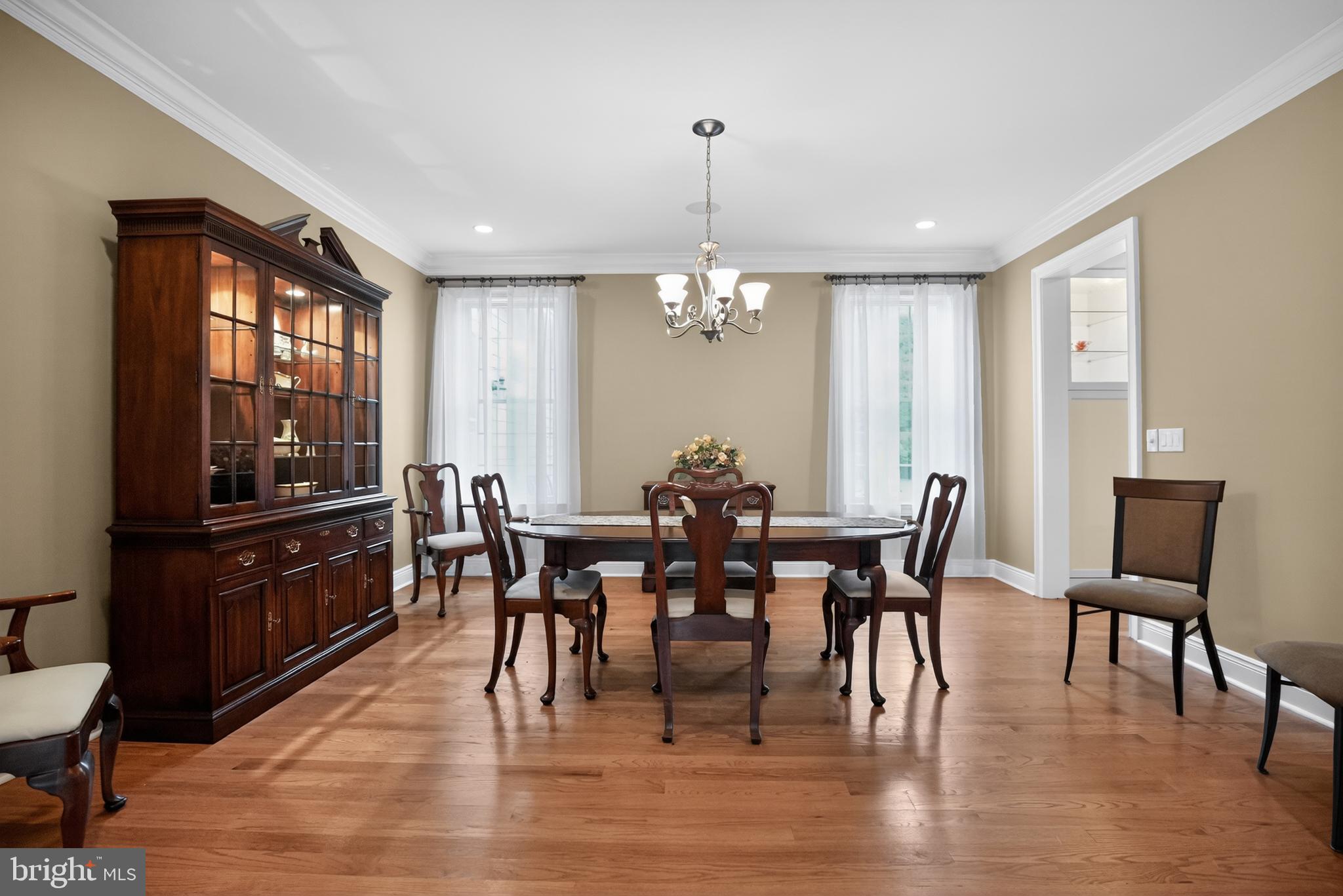 1031 Coates Road Jenkintown, PA 19046 - Photo 13 of 66 a view of a dining room with furniture window and wooden floor
