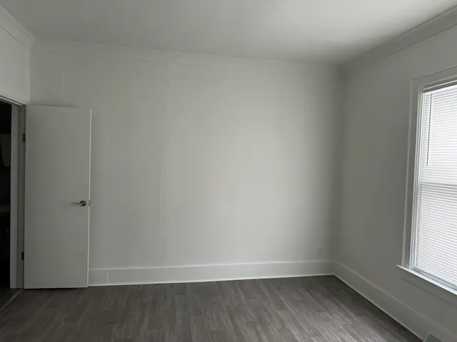 a view of an empty room and window