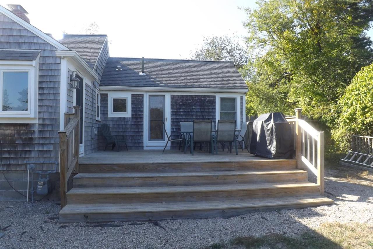 25 Doane Road Harwich Port, MA 02646 - Photo 16 of 18 a front view of a house with a porch