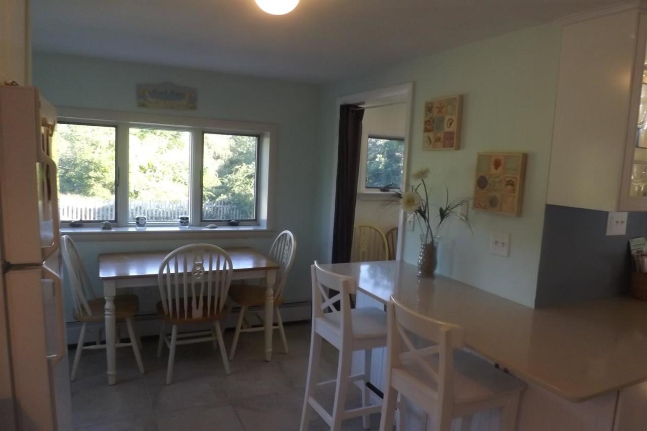 25 Doane Road Harwich Port, MA 02646 - Photo 6 of 18 a view of a dining room with furniture window and outside view