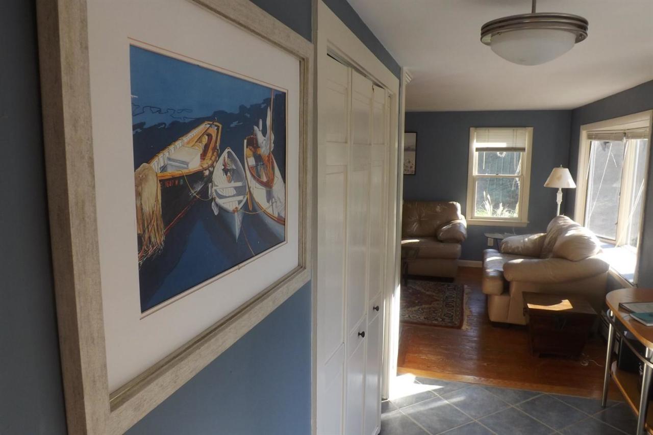 25 Doane Road Harwich Port, MA 02646 - Photo 7 of 18 a living room with furniture and a painting on the wall