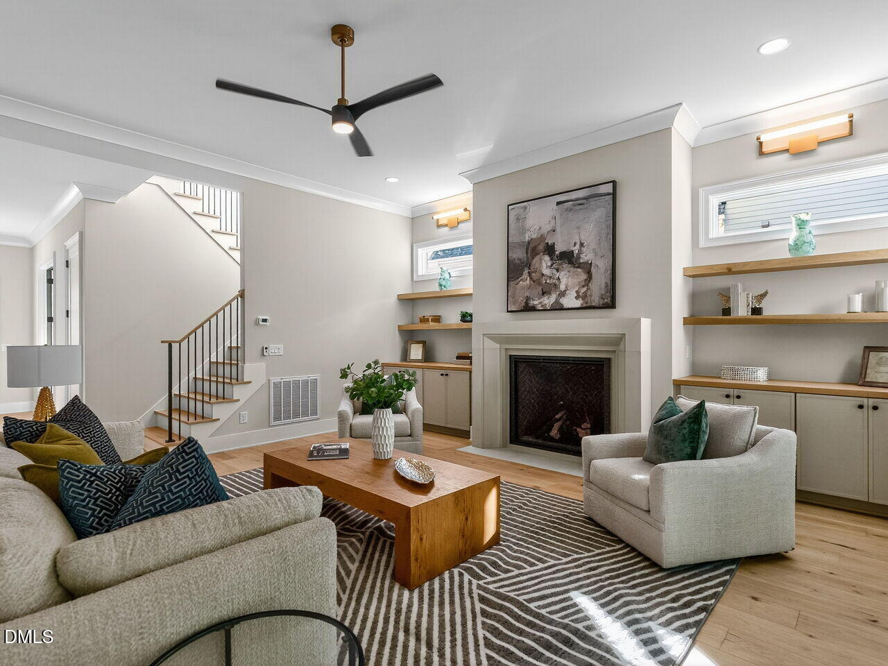 1309 Montvale Ridge Drive Cary, NC 27519 - Photo 6 of 24 a living room with furniture and a fireplace