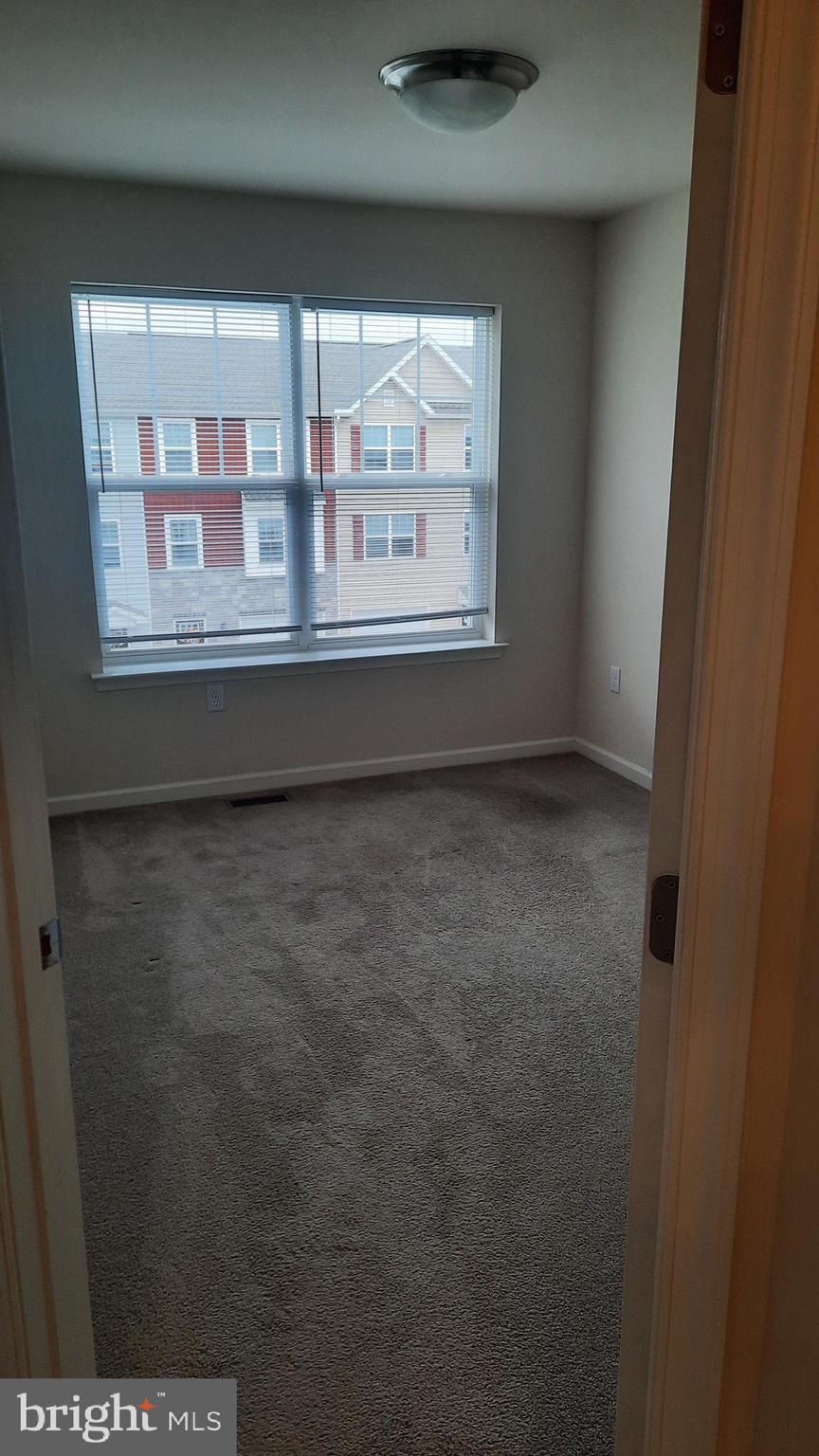 945 Admiral's Quay Drive Mechanicsburg, PA 17050 - Photo 11 of 15 a view of empty room with window