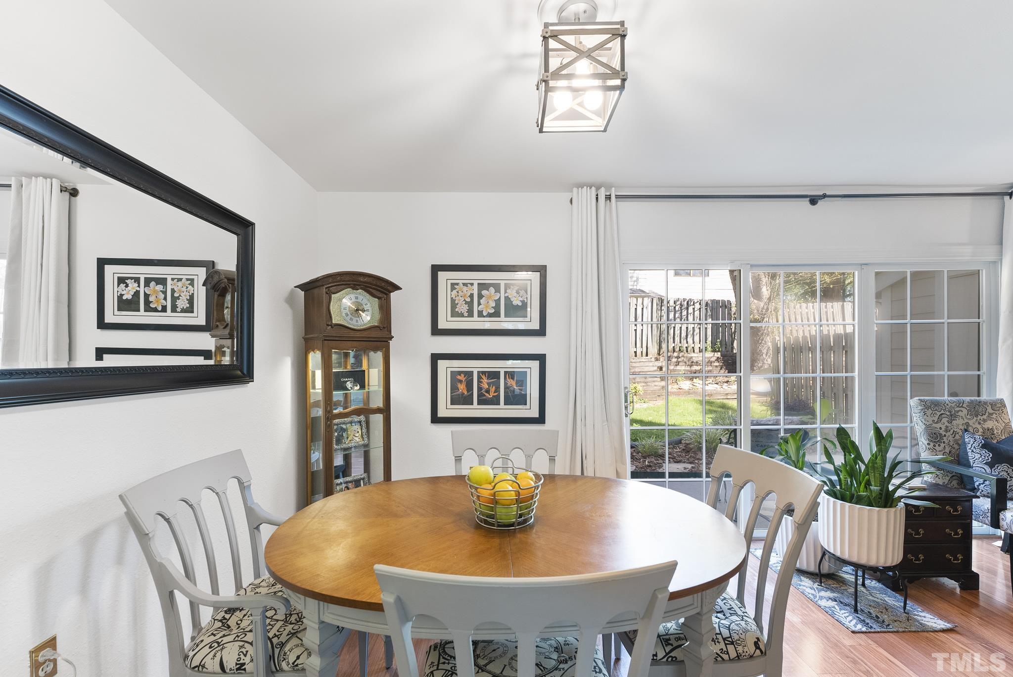 2408 Condor Court, Unit UN2408 Raleigh, NC 27615 - Photo 13 of 39 a view of a dining room with furniture window and outside view