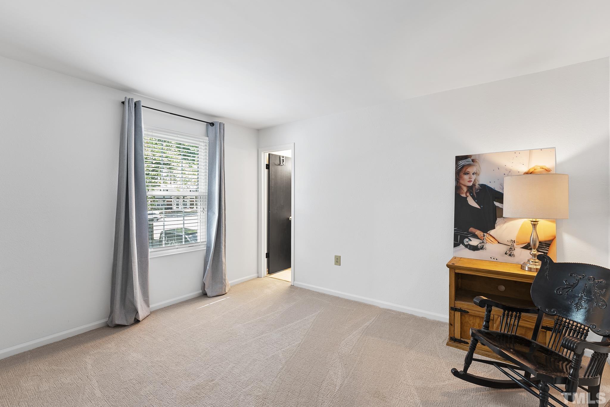 2408 Condor Court, Unit UN2408 Raleigh, NC 27615 - Photo 27 of 39 a view of workspace with furniture and window