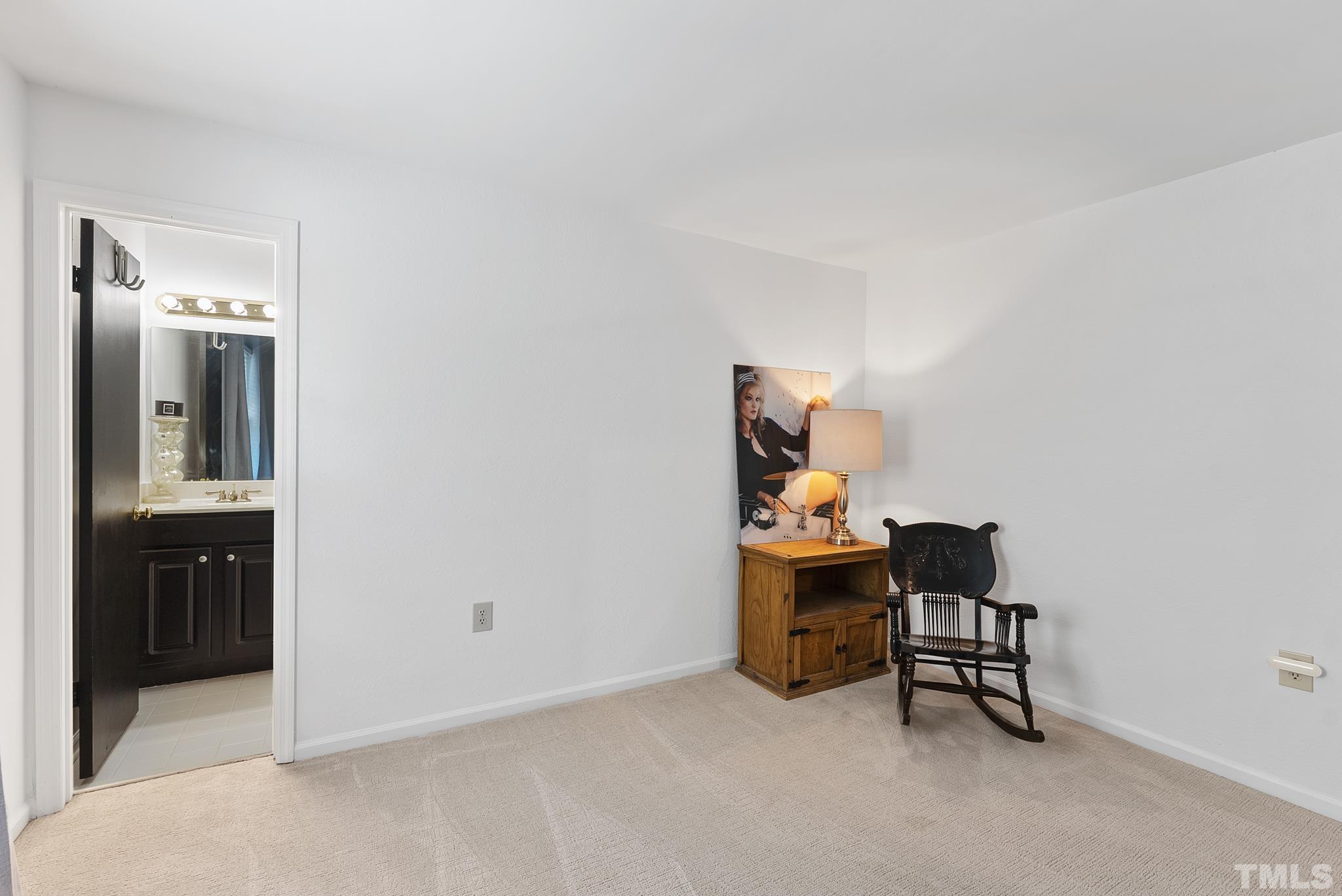 2408 Condor Court, Unit UN2408 Raleigh, NC 27615 - Photo 28 of 39 a workspace with furniture and bathroom