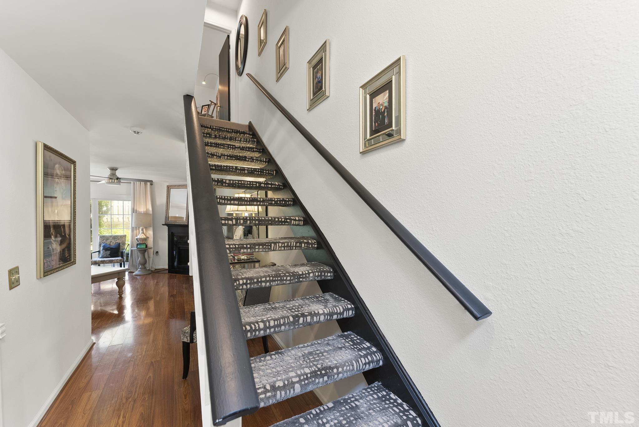 2408 Condor Court, Unit UN2408 Raleigh, NC 27615 - Photo 4 of 39 a view of entryway and hall with wooden floor