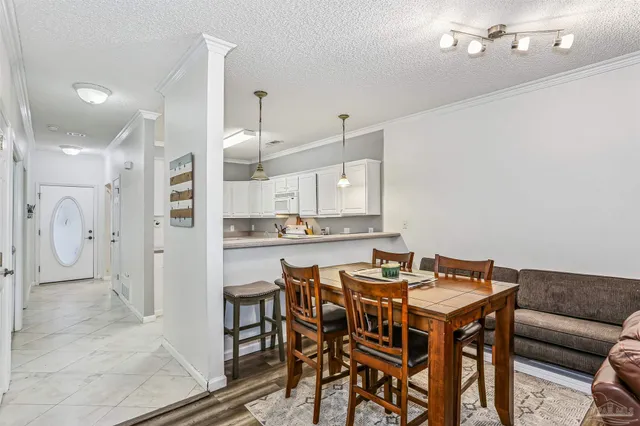 a view of a dining room with furniture