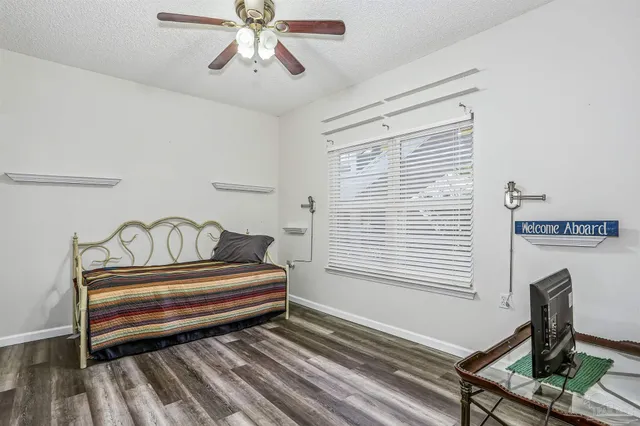 a view of a workspace with furniture