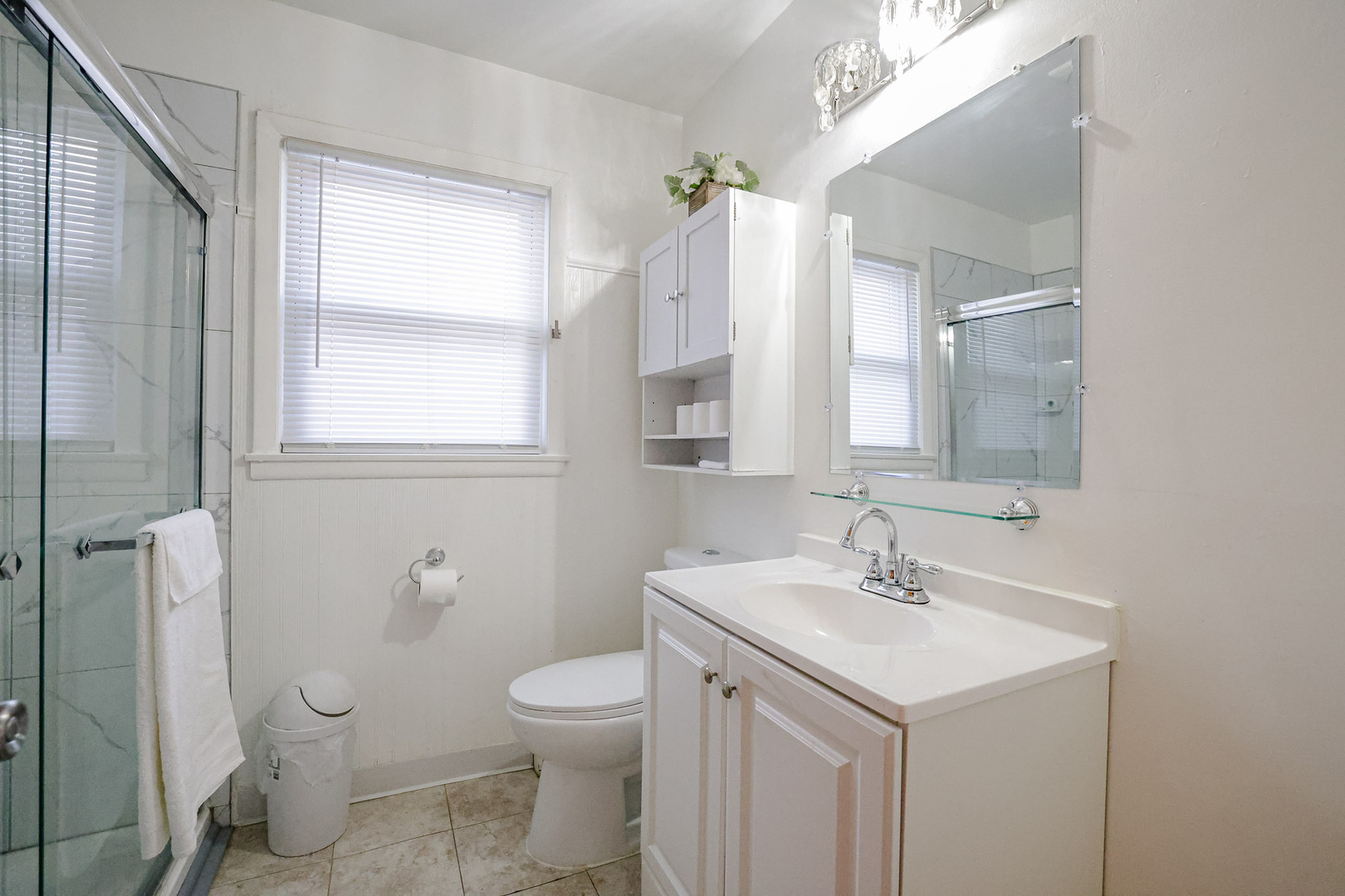 14622 Wabash Avenue Dolton, IL 60419 - Photo 3 of 18 a bathroom with a toilet sink and mirror