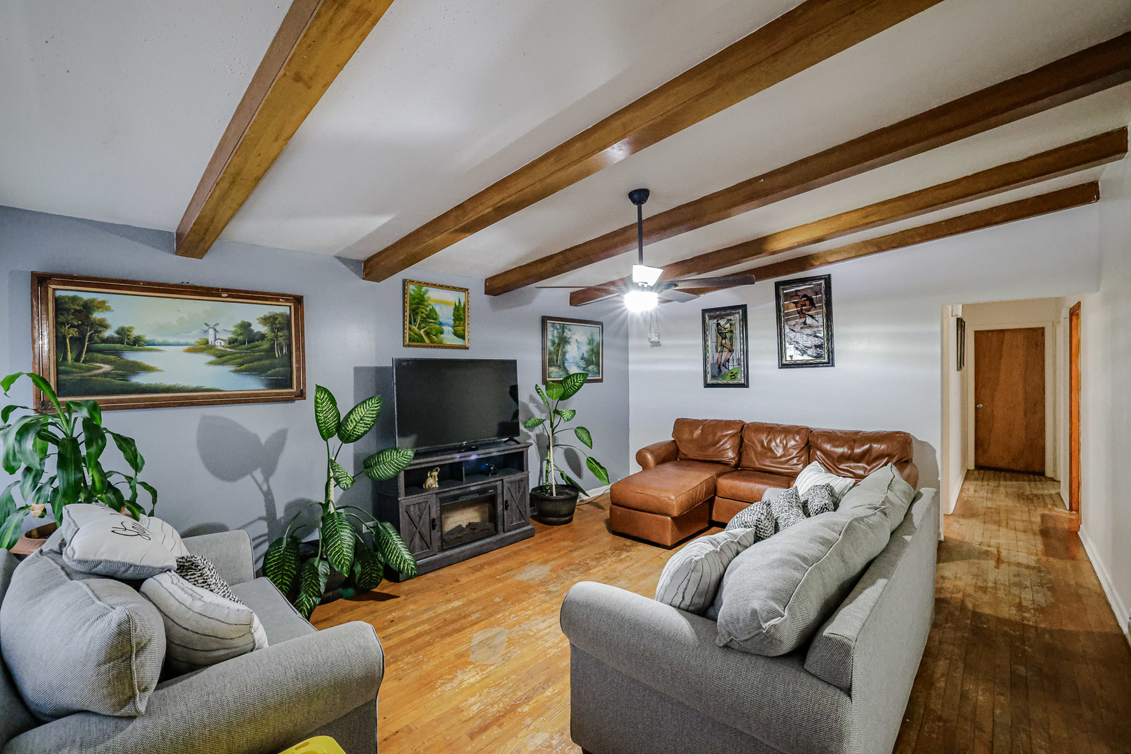 14622 Wabash Avenue Dolton, IL 60419 - Photo 7 of 18 a living room with furniture and a flat screen tv