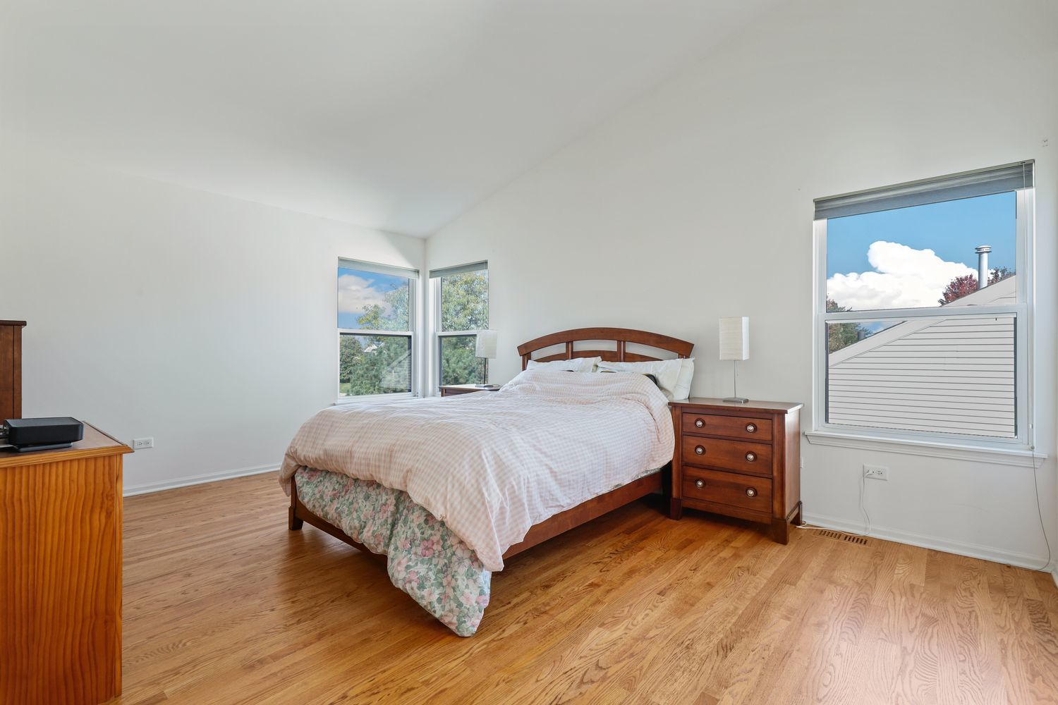 3501 Mustang Road Joliet, IL 60435 - Photo 13 of 35 a bedroom with a bed and a flat tv screen on dresser