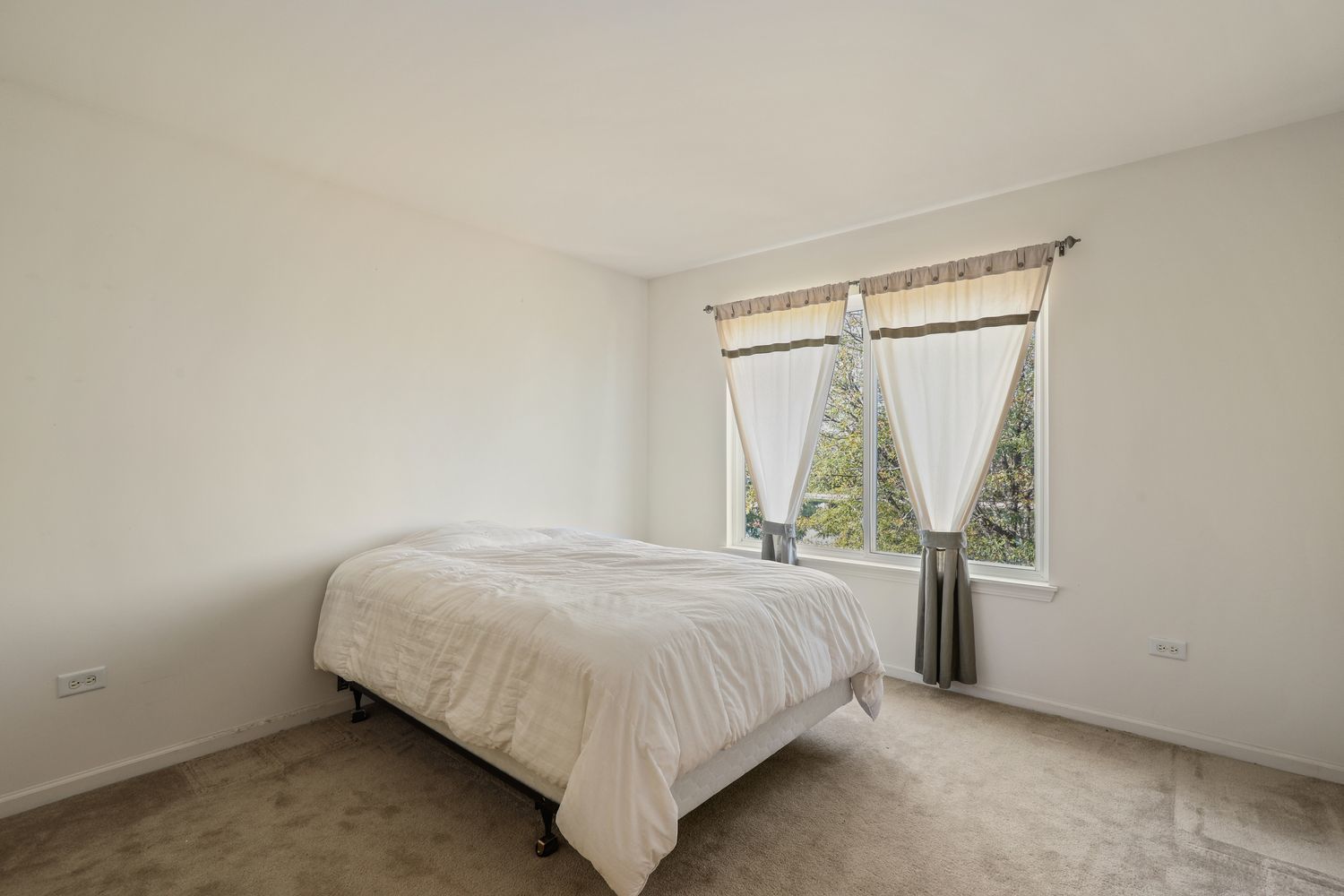 3501 Mustang Road Joliet, IL 60435 - Photo 16 of 35 a bedroom with a bed and a window