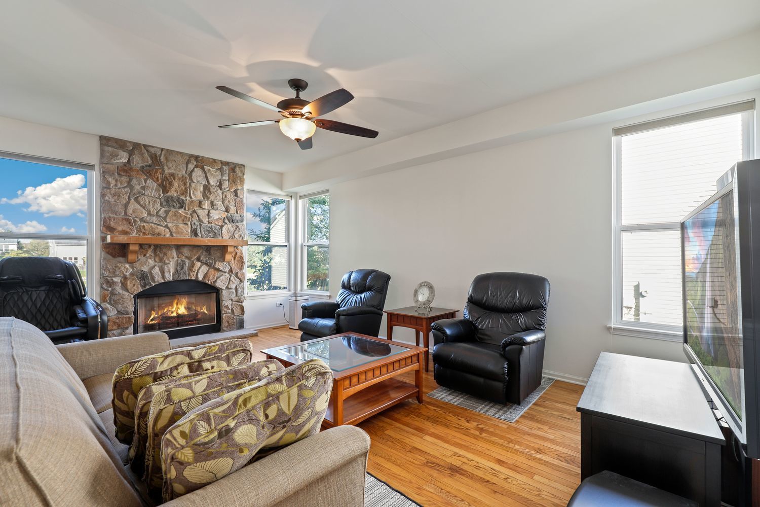 3501 Mustang Road Joliet, IL 60435 - Photo 2 of 35 a living room with furniture and a fireplace
