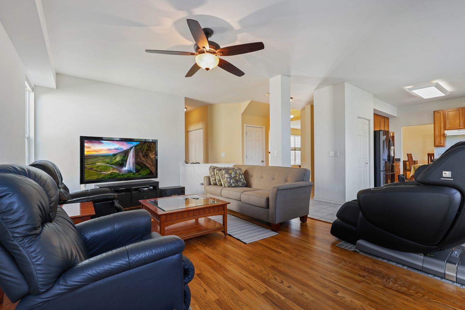 3501 Mustang Road Joliet, IL 60435 - Photo 3 of 35 a living room with furniture and a flat screen tv