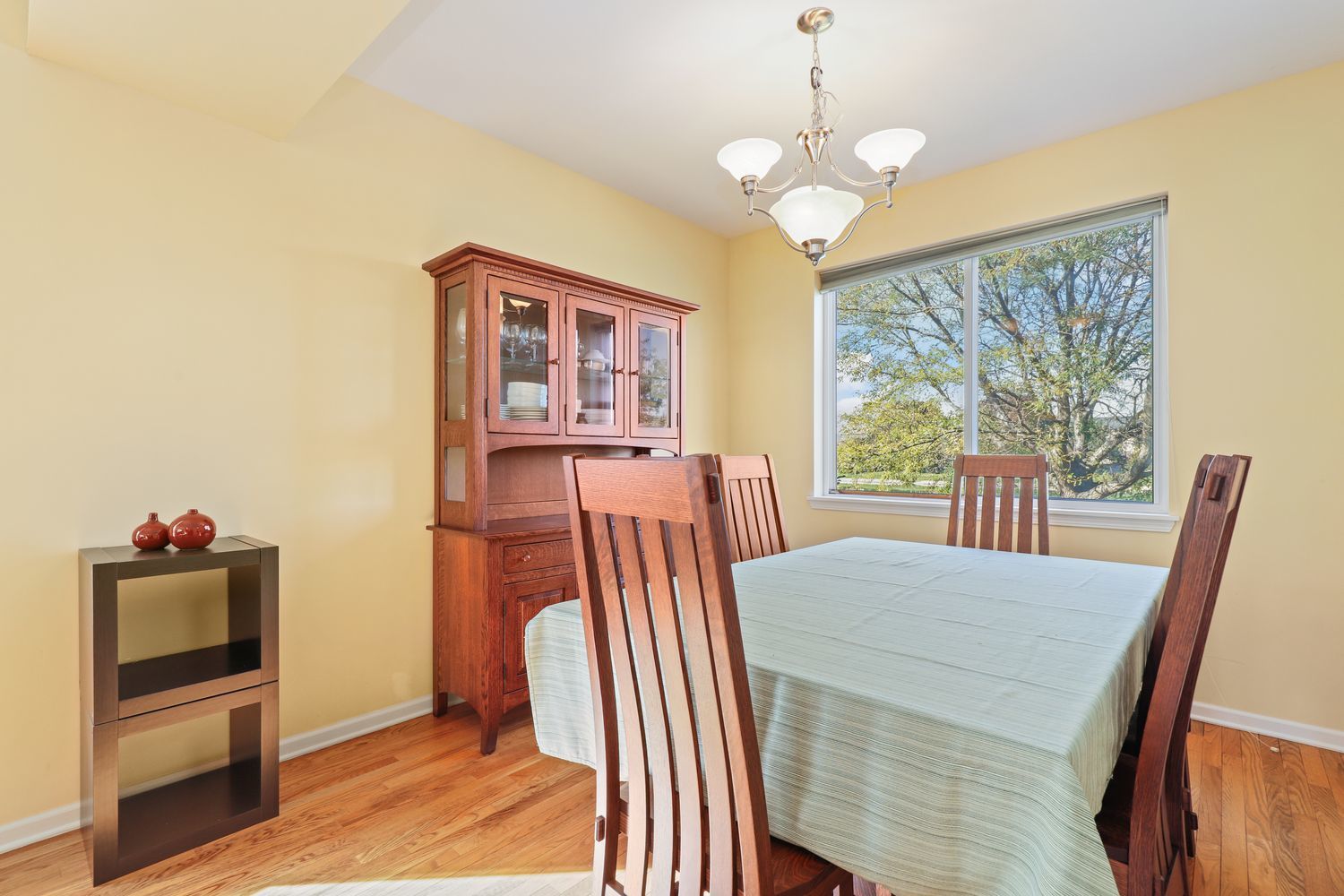3501 Mustang Road Joliet, IL 60435 - Photo 8 of 35 a view of a dining room with furniture and a chandelier