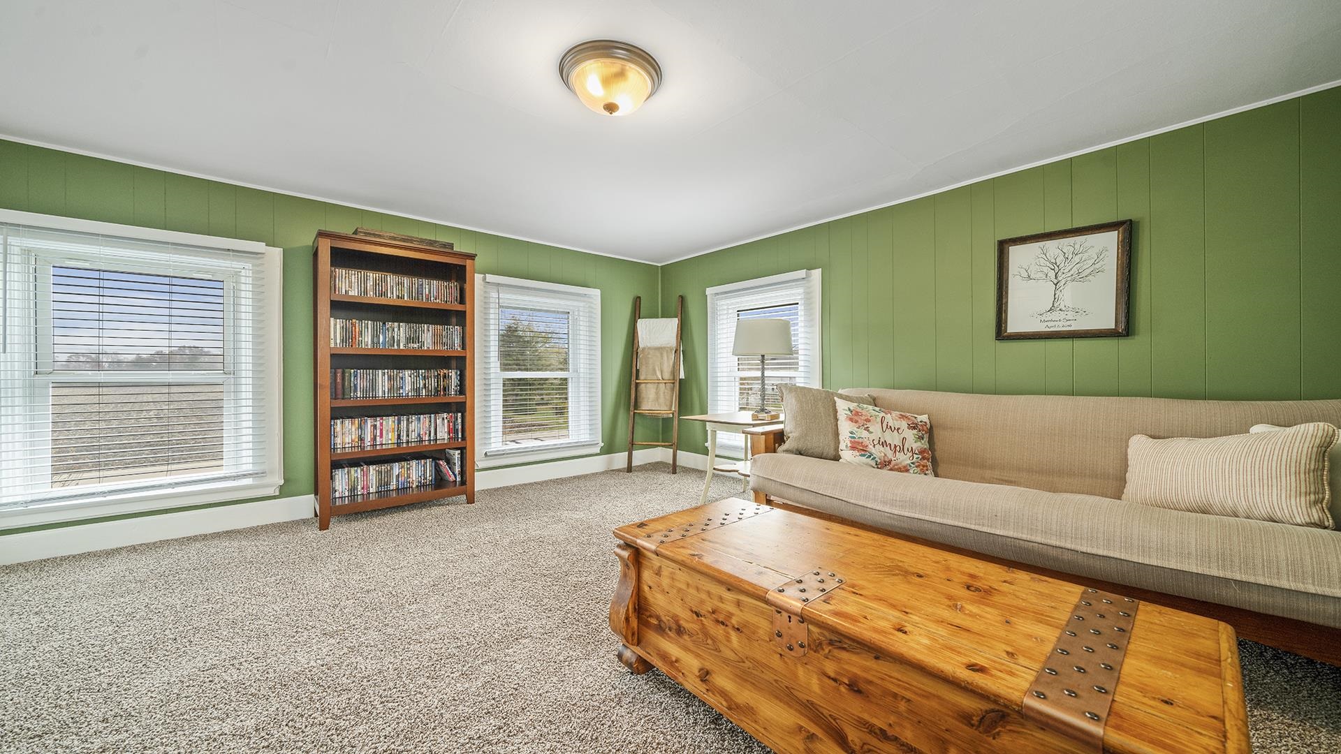 211 North Shabbona Road Shabbona, IL 60550 - Photo 23 of 33 a living room with furniture and a large window
