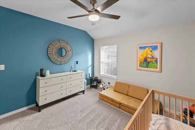 a utility room with dryer washer and wooden floor