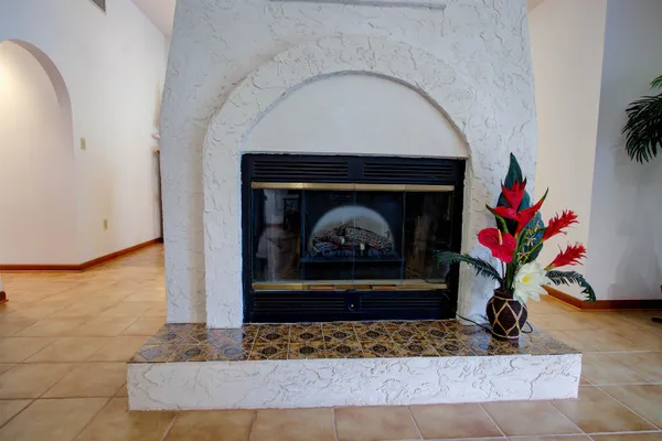a living room with a fireplace