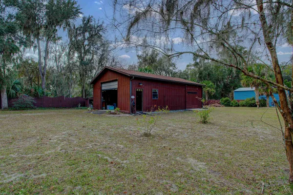 a backyard of a house with lots of green space