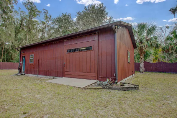 a view of a backyard of the house
