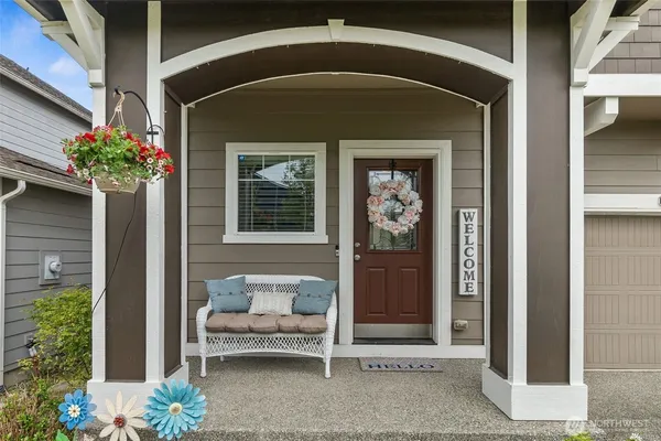 a front view of a house with a porch