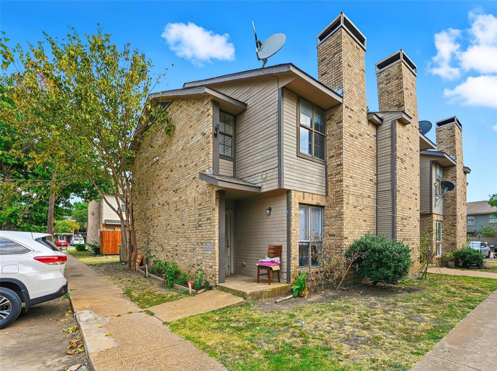 8001 Rothington Road, Unit 3137 Dallas, TX 75227 - Photo 11 of 38 a front view of a house with garden