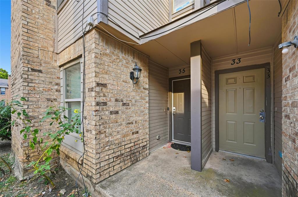 8001 Rothington Road, Unit 3137 Dallas, TX 75227 - Photo 16 of 38 a view of entryway with brick walls