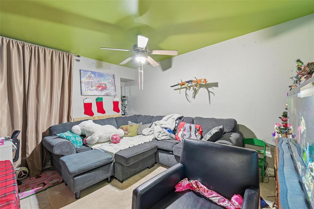 8001 Rothington Road, Unit 3137 Dallas, TX 75227 - Photo 38 of 38 a living room with furniture and a couch