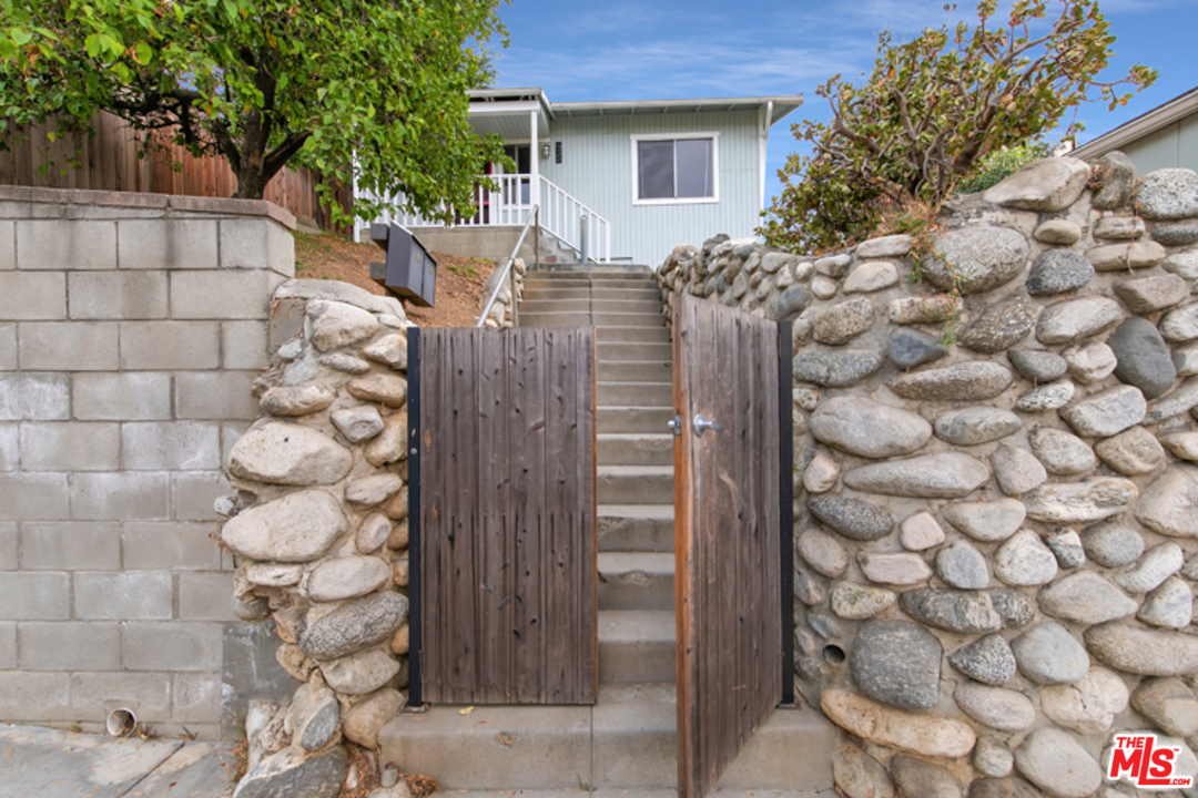 5122 Raphael Street Los Angeles, CA 90042 - Photo 1 of 37 a view of an outdoor space and a house