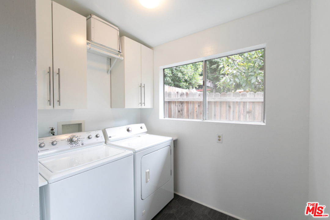 5122 Raphael Street Los Angeles, CA 90042 - Photo 16 of 37 a utility room with dryer and washer