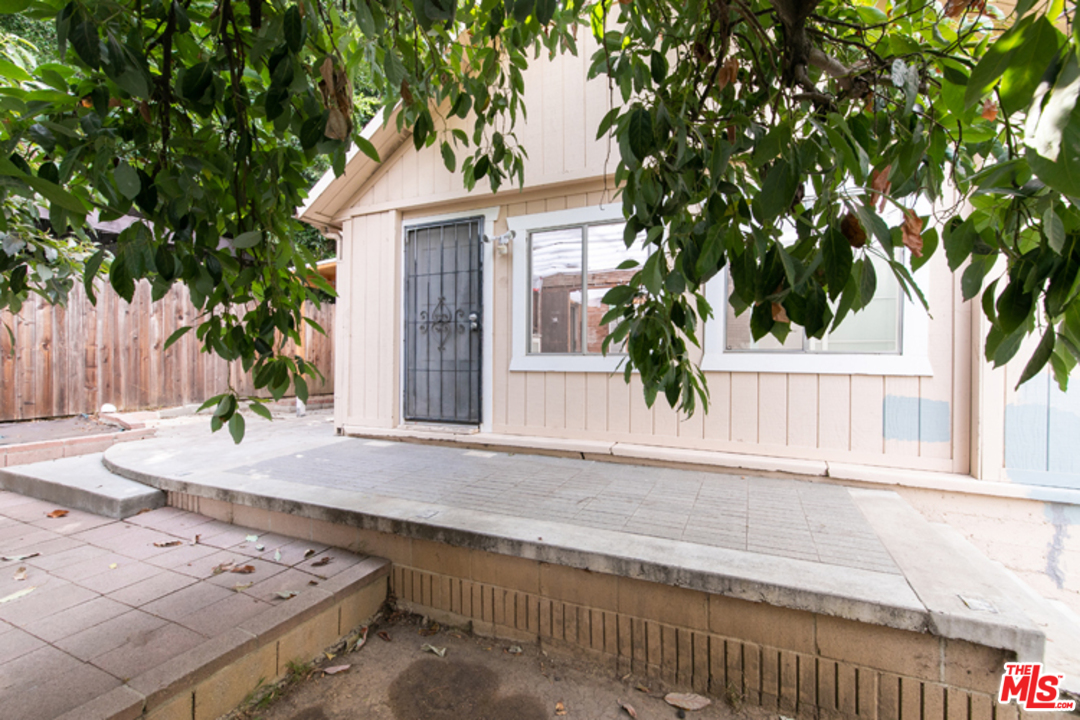 5122 Raphael Street Los Angeles, CA 90042 - Photo 23 of 37 a front view of a house with garden