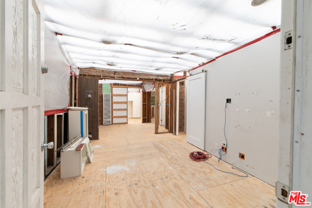 5122 Raphael Street Los Angeles, CA 90042 - Photo 24 of 37 a view of a hallway with a large window