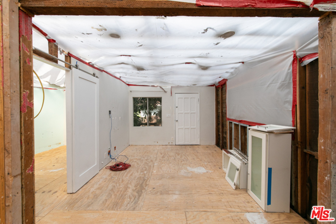 5122 Raphael Street Los Angeles, CA 90042 - Photo 25 of 37 a view of a hallway with a window