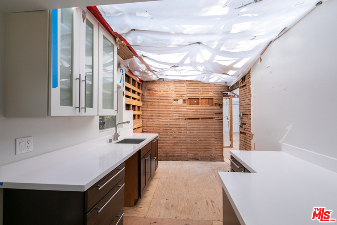 5122 Raphael Street Los Angeles, CA 90042 - Photo 29 of 37 a storage room with cabinets