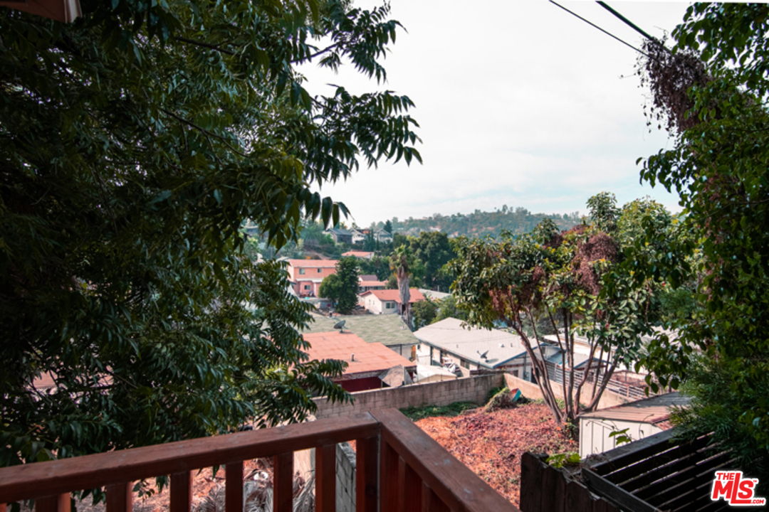 5122 Raphael Street Los Angeles, CA 90042 - Photo 30 of 37 a view of a terrace with a tree