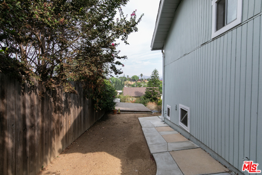 5122 Raphael Street Los Angeles, CA 90042 - Photo 34 of 37 a view of a pathway both side of house