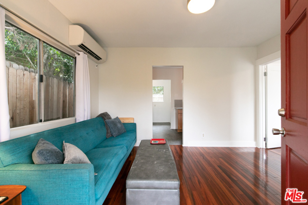 5122 Raphael Street Los Angeles, CA 90042 - Photo 6 of 37 a living room with furniture and a wooden floor