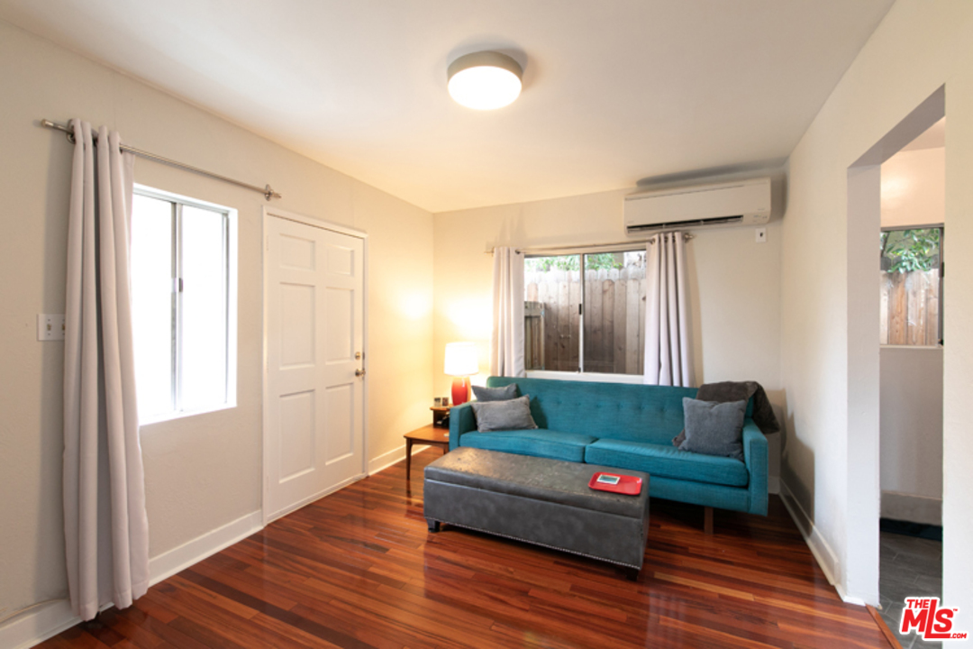 5122 Raphael Street Los Angeles, CA 90042 - Photo 7 of 37 a living room with furniture and a window