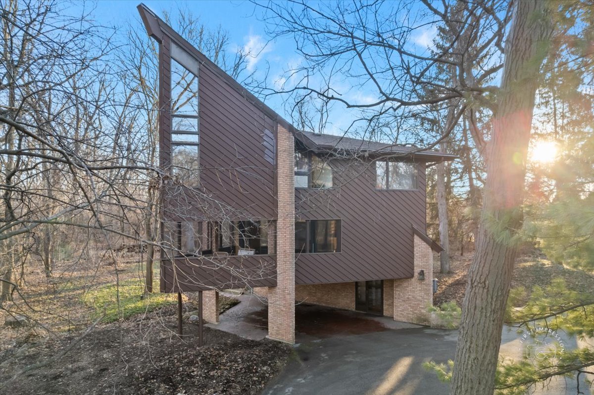 3N286 Klein Road West Chicago, IL 60185 - Photo 1 of 44 a view of a house with a yard and wooden fence