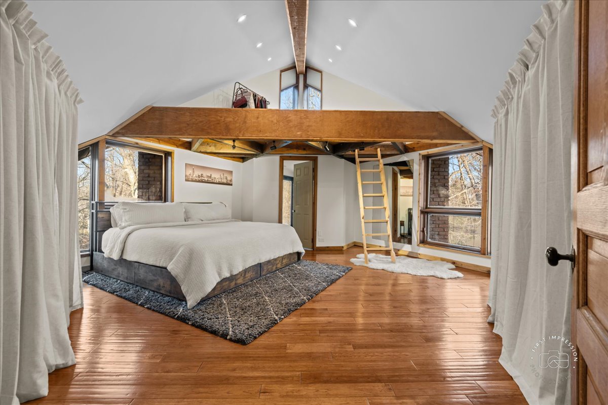 3N286 Klein Road West Chicago, IL 60185 - Photo 17 of 44 a spacious bedroom with a bed and wooden floor