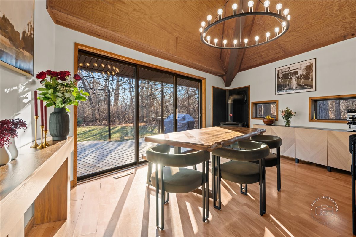 3N286 Klein Road West Chicago, IL 60185 - Photo 10 of 44 a view of a dining room with furniture wooden floor and chandelier
