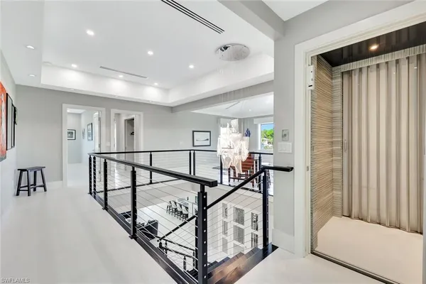 a bedroom with furniture and a rug