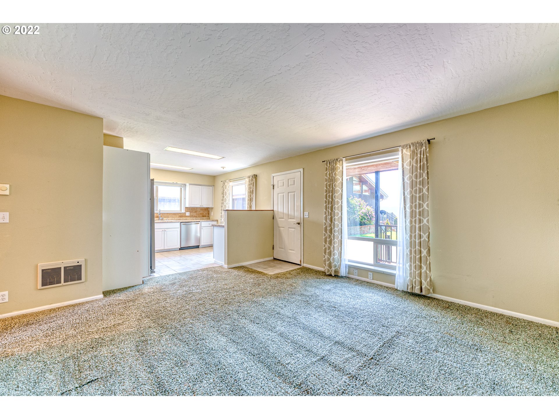 95525 West Huckleberry Ridge Road Brookings, OR 97415 - Photo 23 of 32 a view of an empty room with a window