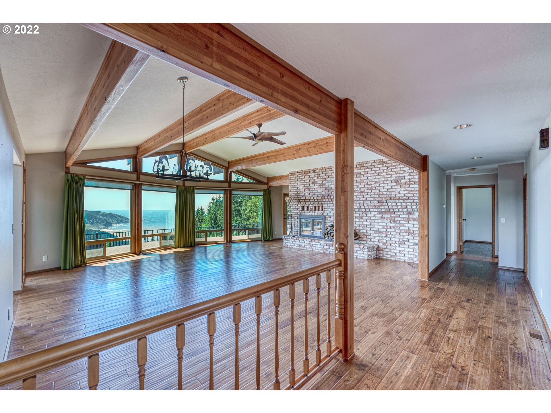 95525 West Huckleberry Ridge Road Brookings, OR 97415 - Photo 5 of 32 a view of porch with a floor to ceiling window