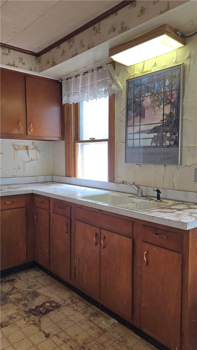 302 Field Street Rochester, NY 14620 - Photo 5 of 32 Plenty of Potential In The Large Kitchen.