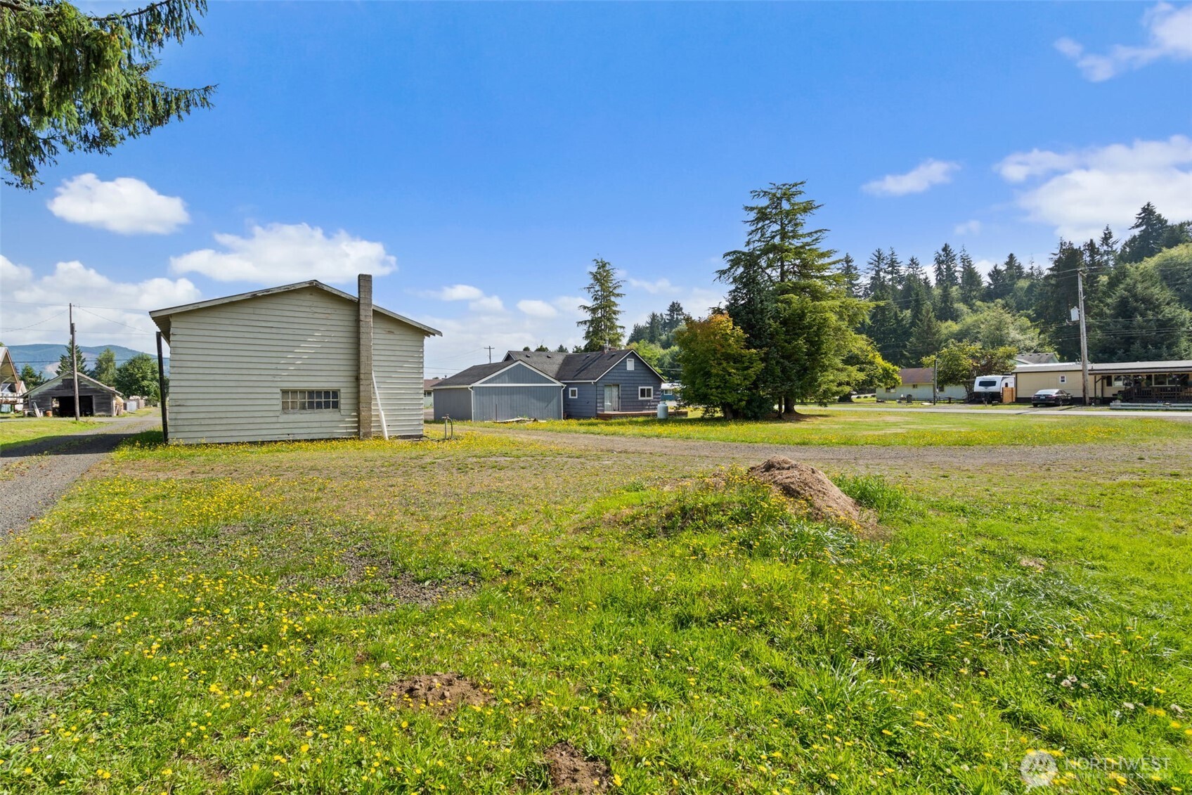 1206 West 4th Street South Bend, WA 98586 - Photo 19 of 29 a view of a house with a yard